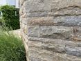 Muret en calcaire franconien avec gazon