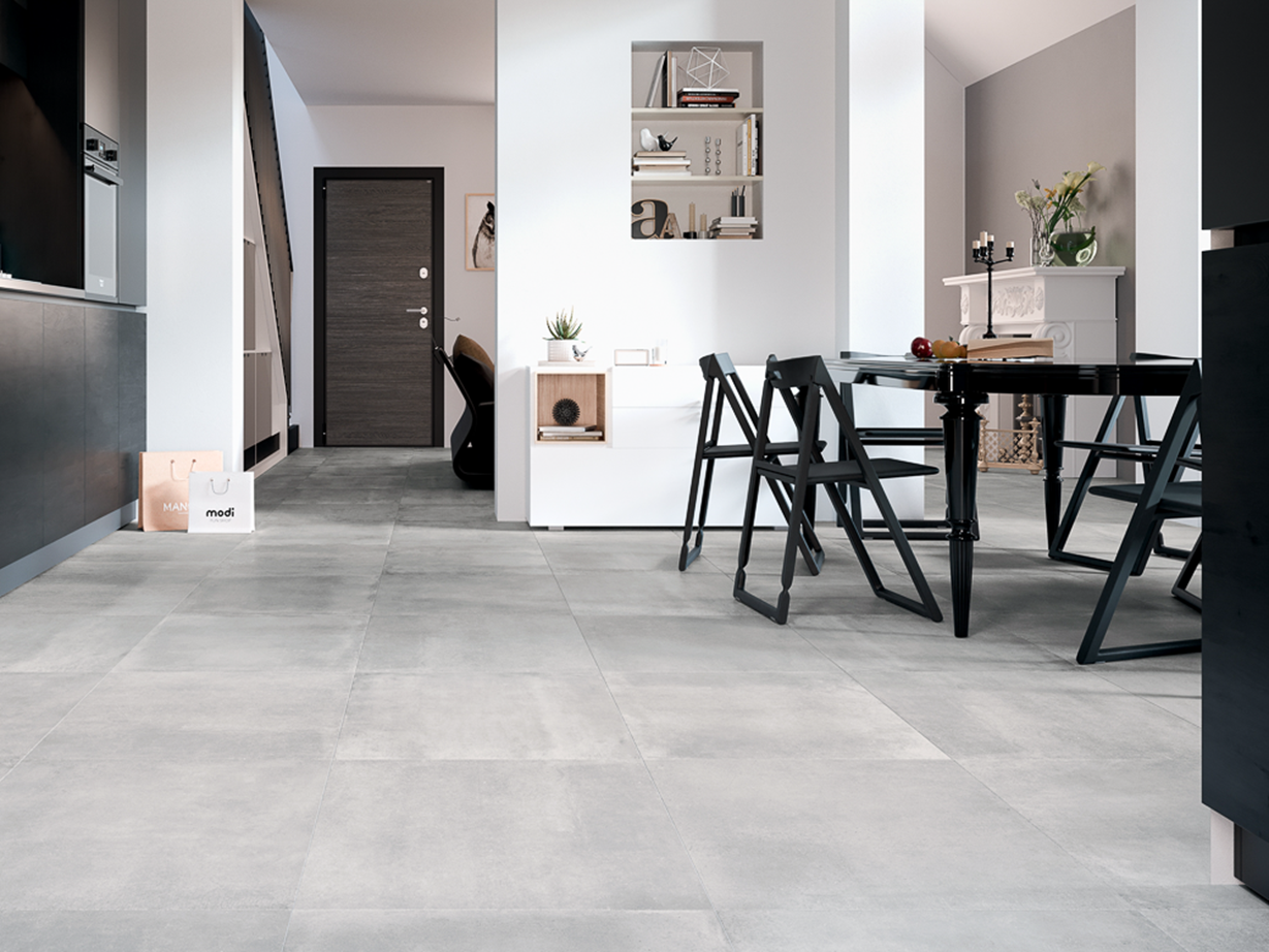 Une cuisine dans laquelle a été posé le carrelage effet béton Pure Clay.